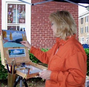 Kelly painting at festival