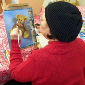Kathy developing the bow on her Teddy bear painting
