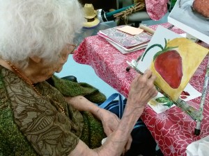 Miss Eyeleen working on her Strawberry painting