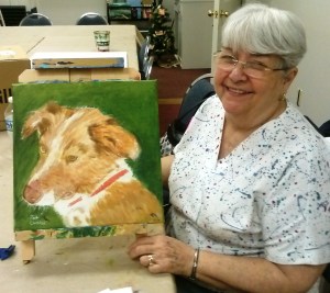 Pat with her painting