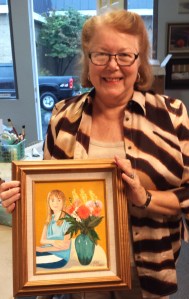 Kay with painting of Granddaughter