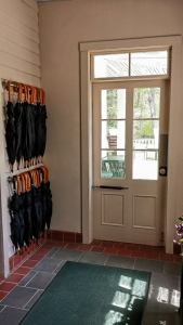 Umbrellas by the door.  They think of everything.