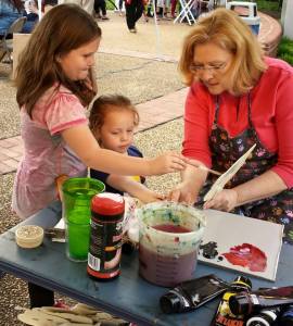 Helping kids paint a Mask!