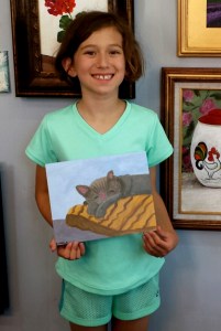 Sophia paints her kitty